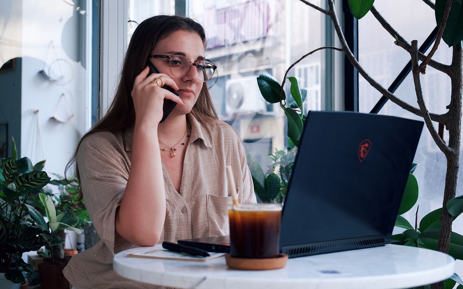 A fractional executive on a video call between two meetings